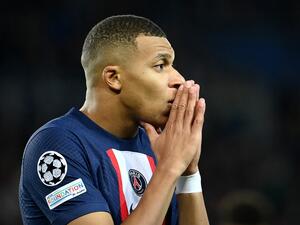 Paris Saint-Germain's French forward Kylian Mbappe reacts during the UEFA Champions League group H football match between Paris Saint-Germain (PSG) and SL Benfica, at The Parc des Princes Stadium, on October 11, 2022. (Photo by FRANCK FIFE / AFP)