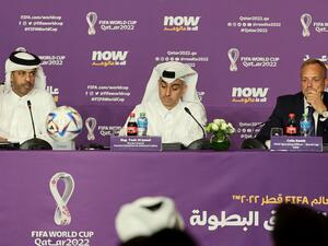 Nasser al-Khater (L), the chief executive of the FIFA World Cup Qatar 2022 organisation, Yasir al-Jamal (C), the chairman of the operations office of Qatar's Supreme Committee and Colin Smith, FIFA's World Cup chief operating officer, give a press conference in Doha on October 17, 2022. (Photo by KARIM JAAFAR / AFP)