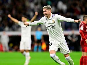 Real Madrid's Uruguayan midfielder Federico Valverde celebrates after scoring his team's third goal during the Spanish league football match between Real Madrid CF and Sevilla FC at the Santiago Bernabeu stadium in Madrid, on October 22, 2022. (Photo by JAVIER SORIANO / AFP)