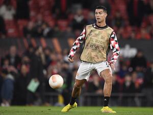 Manchester United's Portuguese striker Cristiano Ronaldo warms up ahead of the UEFA Europa League Group E football match between Manchester United and Omonoia Nicosia, at Old Trafford stadium, in Manchester, north-west England, on October 13, 2022. (Photo by Oli SCARFF / AFP)
