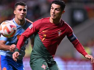 Portugal's forward Cristiano Ronaldo vies with Spain's midfielder Rodrigo Hernandez (L) during the UEFA Nations League, league A, group 2 football match between Portugal and Spain, at the Municipal Stadium in Braga on September 27, 2022. (Photo by PATRICIA DE MELO MOREIRA / AFP)