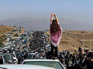 Woman in Iran protests 