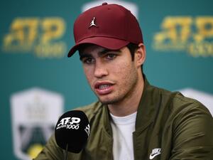 Spain's Carlos Alcaraz Garfia attends a press conference after giving up against Denmark's Holger Rune at the end of their men's singles quarter-final tennis match on day 5 of the ATP World Tour Masters 1000 - Paris Masters (Paris Bercy) - indoor tennis tournament at The AccorHotels Arena in Paris on November 4, 2022. (Photo by Christophe ARCHAMBAULT / AFP)