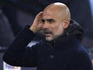 Manchester City's Spanish manager Pep Guardiola looks on ahead of the UEFA Champions League group G football match between Manchester City and Sevilla at the Etihad Stadium in Manchester, north west England on November 2, 2022. (Photo by Oli SCARFF / AFP)