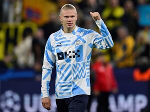 Manchester City's Norwegian striker Erling Haaland reacts after the UEFA Champions League Group G football match between Borussia Dortmund and Manchester City in Dortmund, western Germany on October 25, 2022. The match ended in a 0-0 draw. (Photo by Sascha Schuermann / AFP)
