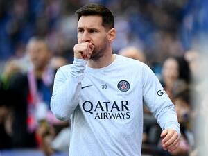 Paris Saint-Germain's Argentine forward Lionel Messi reacts as he warms up prior to the French L1 football match between Paris Saint-Germain FC and AJ Auxerre at the Parc des Princes stadium in Paris on November 13, 2022. (Photo by FRANCK FIFE / AFP)