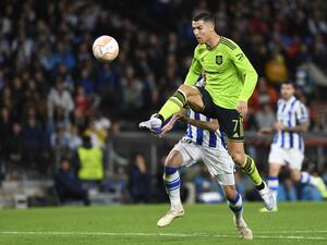 Manchester United's Portuguese striker Cristiano Ronaldo kicks the ball during the UEFA Europa League 1st round group E football match between Real Sociedad and Manchester United at the Anoeta stadium in San Sebastian, on November 3, 2022. (Photo by ANDER GILLENEA / AFP)