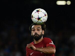 Liverpool's Egyptian forward Mohamed Salah runs with the ball during the UEFA Champions League Group A first leg football match between SSC Napoli and Liverpool FC at the Diego Armando Maradona Stadium in Naples on September 7, 2022. (Photo by Filippo MONTEFORTE / AFP)