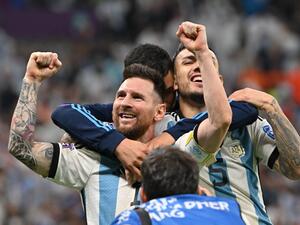 Argentina's forward #10 Lionel Messi celebrates after qualifying to the next round after defeating Netherlands in the penalty shoot-out of the Qatar 2022 World Cup quarter-final football match between Netherlands and Argentina at Lusail Stadium, north of Doha, on December 9, 2022. (Photo by Alberto PIZZOLI / AFP)