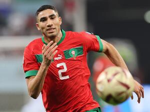 Morocco's defender #02 Achraf Hakimi runs for the ball during the Qatar 2022 World Cup third place play-off football match between Croatia and Morocco at Khalifa International Stadium in Doha on December 17, 2022. (Photo by KARIM JAAFAR / AFP)