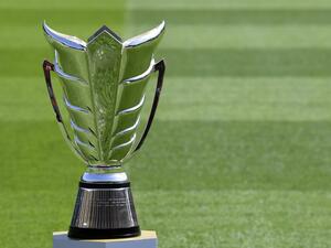 This picture taken on January 31, 2019 shows the AFC Asian Cup trophy on display ahead of the final match between Japan and Qatar, at Zayed Sports City Stadium in Abu Dhabi. While Japan have the Asian Cup pedigree, Qatar's over-achieving players might just feel that their name is on the trophy after a record-breaking run to their first-ever final. / AFP / Khaled DESOUKI