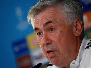Real Madrid's Italian coach Carlo Ancelotti addresses a press conference at the Ciudad Real Madrid training complex in Valdebebas, outskirts of Madrid, on November 1, 2022, on the eve of their UEFA Champions League football match against Celtic FC. (Photo by PIERRE-PHILIPPE MARCOU / AFP)