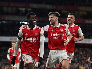 Arsenal's English striker Eddie Nketiah celebrates after scoring his team third goal during the English Premier League football match between Arsenal and West Ham United at the Emirates Stadium in London on December 26, 2022. (Photo by Glyn KIRK / AFP)