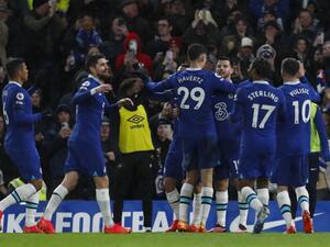 Chelsea's English midfielder Mason Mount (rear C) celebrates with teammates after scoring his team second goal during the English Premier League football match between Chelsea and Bournemouth at Stamford Bridge in London on December 27, 2022. (Photo by Ian Kington / AFP)