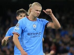 Manchester City's Norwegian striker Erling Haaland celebrates his goal during the UEFA Champions League group G football match between England's Manchester City and Germany's Borussia Dortmund at the Etihad Stadium in Manchester on September 14, 2022. (Photo by Lindsey Parnaby / AFP)