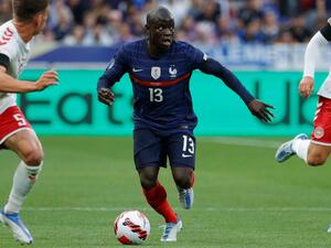 France's midfielder N'Golo Kante (C) controls the ball during the UEFA Nations League - League A Group 1 first leg football match between France and Denmark at the Stade de France in Saint-Denis, north of Paris, on June 3, 2022. (Photo by Geoffroy VAN DER HASSELT / AFP)