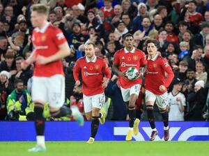 Manchester United's English striker Marcus Rashford (2R) celebrates scoring the team's second goal during the English League Cup third round football match between Manchester United and Aston Villa at Old Trafford in Manchester, north west England, on November 10, 2022. (Photo by Lindsey Parnaby / AFP)