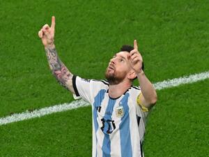 Argentina's forward #10 Lionel Messi reacts after scoring his team's first goal during the Qatar 2022 World Cup round of 16 football match between Argentina and Australia at the Ahmad Bin Ali Stadium in Al-Rayyan, west of Doha on December 3, 2022. (Photo by Glyn KIRK / AFP)