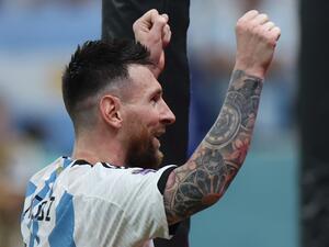 Argentina's forward #10 Lionel Messi celebrates after Argentina's forward #09 Julian Alvarez (unseen) scored his team's third goal during the Qatar 2022 World Cup football semi-final match between Argentina and Croatia at Lusail Stadium in Lusail, north of Doha on December 13, 2022. (Photo by Giuseppe CACACE / AFP)