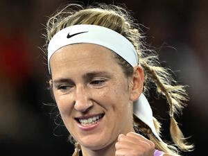 Belarus' Victoria Azarenka celebrates victory against Jessica Pegula of the US after their women's singles quarter-final match on day nine of the Australian Open tennis tournament in Melbourne on January 24, 2023. (Photo by Paul CROCK / AFP)