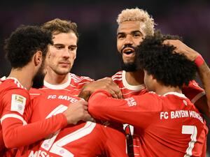 Bayern Munich's German midfielder Jamal Musiala (C) celebrates scoring the opening goal with his team mates during the German first division Bundesliga football match between Bayern Munich and Werder Bremen in Munich, southern Germany, on November 8, 2022. (Photo by CHRISTOF STACHE / AFP)