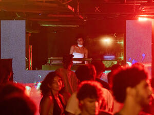 People attend a music performance by Egyptian DJ Yas Meen Selectress