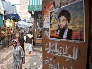 صورة لـ حسن نصرالله في اسواق اليمن