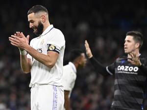 Real Madrid's French forward Karim Benzema reacts during the Spanish league football match between Real Madrid CF and Real Sociedad at the Santiago Bernabeu stadium in Madrid on January 29, 2023. (Photo by OSCAR DEL POZO / AFP)
