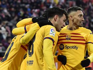 Barcelona's Spanish midfielder Pedri (2R) celebrates scoring the opening goal during the Spanish League football match between Girona FC and FC Barcelona at the Montilivi stadium in Girona on January 28, 2023. (Photo by Pau BARRENA / AFP)