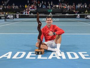 Serbian tennis player Novak Djokovic celebrates after winning the final of the ATP Adelaide International tournament against Sebastian Korda of the US in Adelaide on January 8, 2023. (Photo by Brenton EDWARDS / AFP)