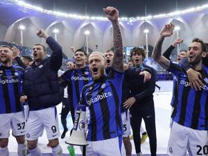 Inter's players celebrate with the fans after winning the Italian SuperCup football match between AC Milan and Inter Milan, at the King Fahd International Stadium in Riyadh on January 18, 2023. (Photo by Giuseppe CACACE / AFP)