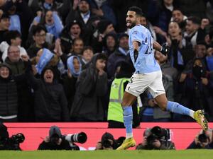Manchester City's Algerian midfielder Riyad Mahrez celebrates scoring the team's fourth goal during the English Premier League football match between Manchester City and Tottenham Hotspur at the Etihad Stadium in Manchester, north west England, on January 19, 2023. (Photo by Oli SCARFF / AFP)