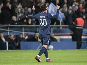 Paris Saint-Germain's Argentine forward Lionel Messi celebrates scoring his team's second goal during the French L1 football match between Paris Saint-Germain (PSG) and SCO Angers at The Parc des Princes Stadium in Paris on January 11, 2023. (Photo by Geoffroy VAN DER HASSELT / AFP)