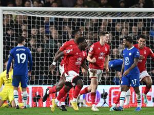 Nottingham Forest's Ivorian Coast defender Serge Aurier (C) celebrates after scoring their first goal during the English Premier League football match between Nottingham Forest and Chelsea at The City Ground in Nottingham, central England, on January 1, 2023. (Photo by Paul ELLIS / AFP)
