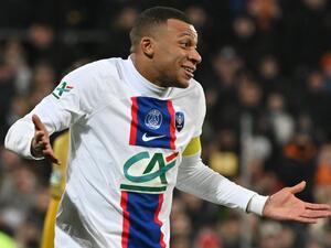 Paris Saint-Germain's French forward Kylian Mbappe celebrates after scoring a goal during the French Cup round of 32 football match between US Pays de Cassel and Paris Saint-Germain (PSG) at the Bollaert-Delelis stadium in Lens, northern France on January 23, 2023. (Photo by Francois LO PRESTI / AFP)