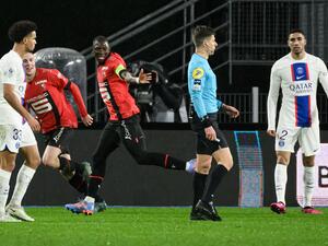 Rennes' Malian defender Hamari Traore celebrates after scoring a goal during the French L1 football match between Stade Rennais FC and Paris Saint-Germain (PSG) at the Roazhon Park stadium in Rennes, western France, on January 15, 2023. (Photo by LOIC VENANCE / AFP)