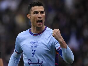 Riyadh All-Star's Portuguese forward Cristiano Ronaldo celebrates his team's third goal during the Riyadh Season Cup football match between the Riyadh All-Stars and Paris Saint-Germain at the King Fahd Stadium in Riyadh on January 19, 2023. (Photo by FRANCK FIFE / AFP)