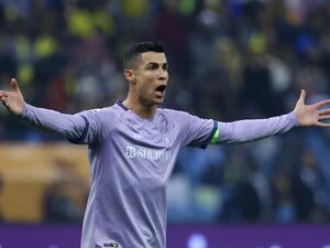 Nassr's Portuguese forward Cristiano Ronaldo reacts during the Saudi Super Cup semi-final football match between Al-Ittihad and Al-Nassr at the King Fahd Stadium in Riyadh on January 26, 2023. (Photo by Fayez NURELDINE / AFP)
