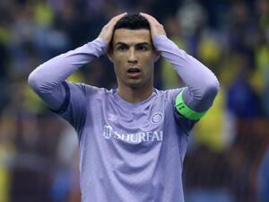 Nassr's Portuguese forward Cristiano Ronaldo reacts to a missed chance during the Saudi Super Cup semi-final football match between Al-Ittihad and Al-Nassr at the King Fahd Stadium in Riyadh on January 26, 2023. (Photo by Fayez NURELDINE / AFP)