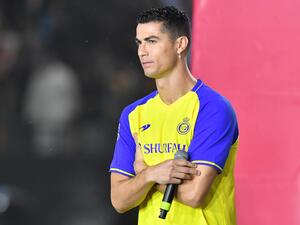 Al-Nassr's new Portuguese forward Cristiano Ronaldo takes the stage during his unveiling at the Mrsool Park Stadium in the Saudi capital Riyadh on January 3, 2023. (Photo by AFP)
