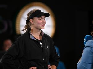 Kazakhstan's Elena Rybakina is interviewed following her win against Belarus' Victoria Azarenka during their women's singles semi-final match on day eleven of the Australian Open tennis tournament in Melbourne on January 26, 2023. (Photo by WILLIAM WEST / AFP)