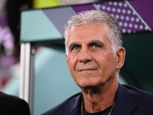 Iran's Portuguese coach Carlos Queiroz reacts during the Qatar 2022 World Cup Group B football match between Iran and USA at the Al-Thumama Stadium in Doha on November 29, 2022. (Photo by Fabrice COFFRINI / AFP)