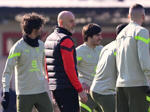 AC Milan's Italian coach Stefano Pioli supervises a training session on February 13, 2023 at the Milanello Sports Center in Carnago, northwest of Milan, on the eve of the UEFA Champions League round of 16 football match between AC Milan and Tottenham Hotspur. (Photo by Marco BERTORELLO / AFP)