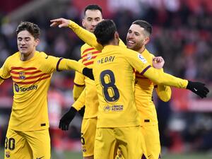 Barcelona's Spanish midfielder Pedri celebrates scoring the opening goal with Barcelona's Spanish defender Jordi Alba (R), Barcelona's Spanish midfielder Sergio Busquets (2L) and Barcelona's Spanish midfielder Gavi (L) during the Spanish League football match between Girona FC and FC Barcelona at the Montilivi stadium in Girona on January 28, 2023. (Photo by Pau BARRENA / AFP)