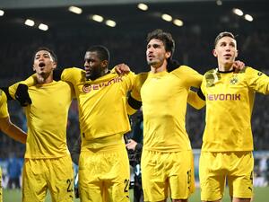 Dortmund's players celebrate after the end of the German Cup (DFB Pokal) football match VfL Bochum v BVB Borussia Dortmund in Bochum, western Germany on February 8, 2023. (Photo by INA FASSBENDER / AFP)