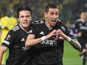 Juventus' Argentine forward Angel Di Maria (R) celebrates with Juventus' Italian midfielder Nicolo Fagioli (L) after scoring his team's second goal during the UEFA Europa League round of 32, second leg football match between FC Nantes and Juventus FC, at The Stade de la Beaujoire in Nantes on February 23, 2023. (Photo by Sebastien SALOM-GOMIS / AFP)