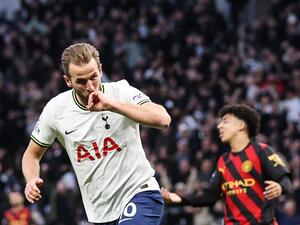 Tottenham Hotspur's English striker Harry Kane celebrates after scoring his team first goal during the English Premier League football match between Tottenham Hotspur and Manchester City at Tottenham Hotspur Stadium in London, on February 5, 2023. (Photo by ADRIAN DENNIS / AFP)