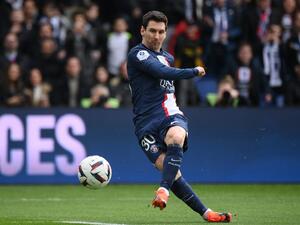 Paris Saint-Germain's Argentine forward Lionel Messi kicks the ball during the French L1 football match between Paris Saint-Germain (PSG) and Lille LOSC at The Parc des Princes Stadium in Paris on February 19, 2023. (Photo by FRANCK FIFE / AFP)