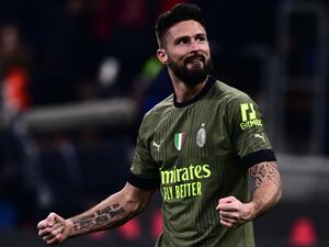 AC Milan's French forward Olivier Giroud celebrates after opening the scoring during the Italian Serie A football match between AC Milan and Torino on February 10, 2023 at the San Siro stadium in Milan. (Photo by Marco BERTORELLO / AFP)