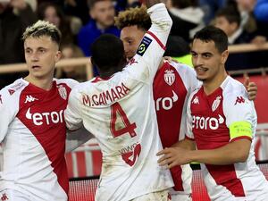 Monaco's French forward Wissam Ben Yedder (R) celebrates with team mates after scoring a goal during the French L1 football match between Monaco and Paris Saint-Germain (PSG) at the Louis II stadium in Monaco on February 11, 2023. (Photo by Valery HACHE / AFP)